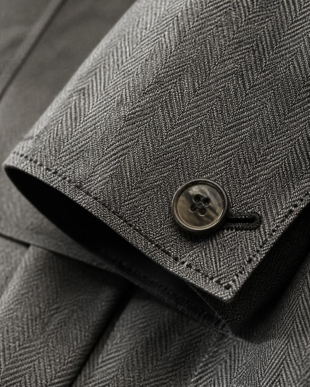 Macro detail of stitching and topstitch thread on a men's garment seam